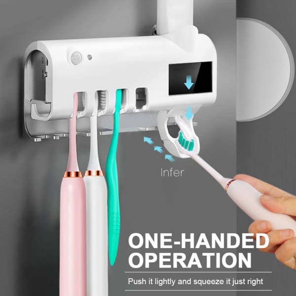 TOOTHBRUSH HOLDER WITH STERILIZER AND PASTE DISPENSER